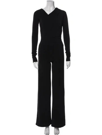 Pre-owned The Andamane V-neck Jumpsuit In Black