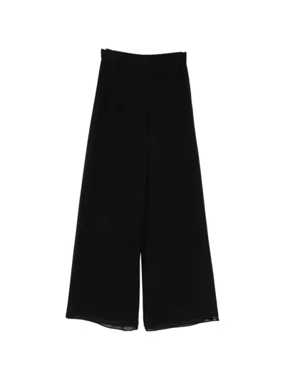 The Andamane Wide-leg Trousers In Black