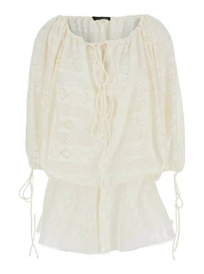 THE ANDAMANE 'WILMA' WHITE JUMPSUIT WITH LONG BALLOON SLEEVES AND ALL-OVER EMBROIDERY