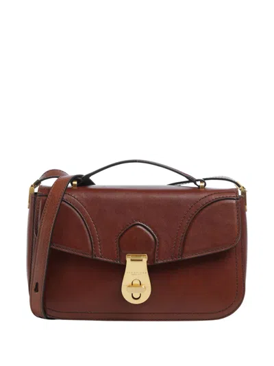 The Bridge Rectangular Shoulder Bag With Gold Turn Lock And Adjustable Strap In Pink