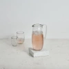 The Collective Home Pebbled Glass Pitcher In Transparent