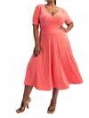 The Curve La Plus Size Knit Surplice Midi Dress With Full Skirt In Bright Coral In Pink