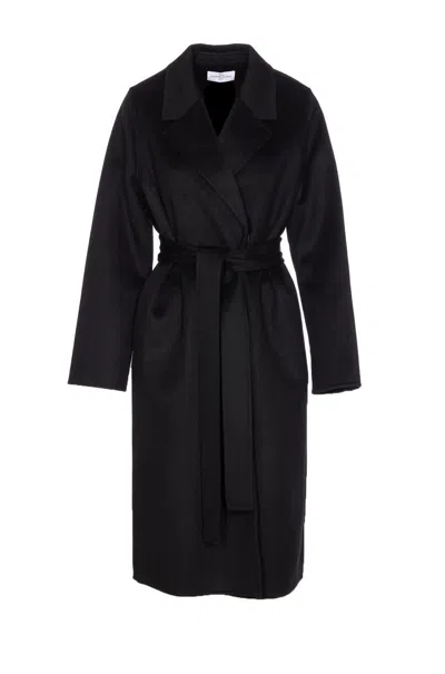 The Dynamis Studio Coats In Black