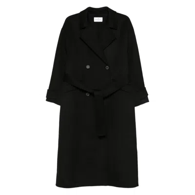 The Dynamis Studio Coats Black