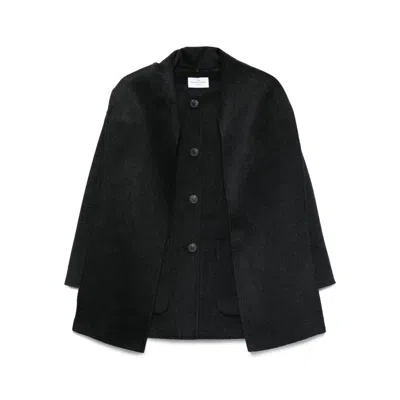 The Dynamis Studio Coats In Black