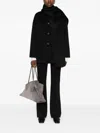 The Dynamis Studio Patch-pockets Single-breasted Coat In Black