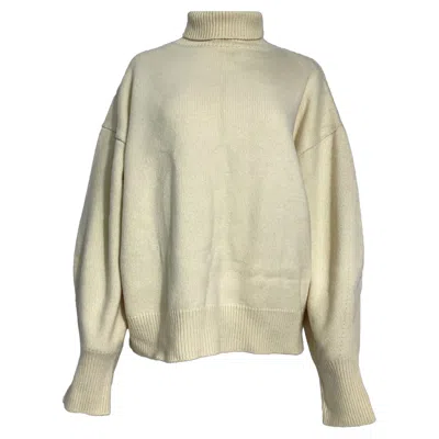 The Frankie Shop Joya Oversized Turtleneck Sweater In Pastel Yellow Merino Wool In Green