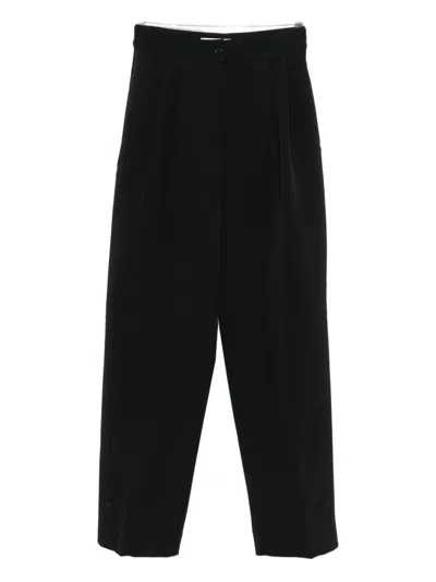 The Frankie Shop Pleated Buttoned Trousers In Black