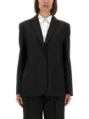 The Garment Relaxed Fit Ribbon Blazer With Unique Back Bow Detail In Black