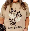 The Graphic Tee Grace + Gratitude Graphic Tee In Beige In Gold