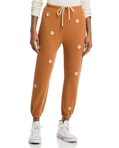 The Great Flo Daisy Embroidered Sweatpants In Brown