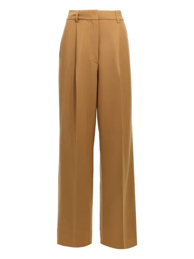 The Latest Axel Pin-tuck Pleated Trousers In Brown