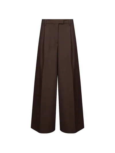 The Latest Deva Pleated Wide-leg Trousers In Brown