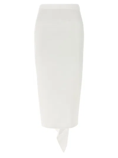 THE LATEST FITTED LONGUETTE SKIRT WITH BACK FLOUNCE