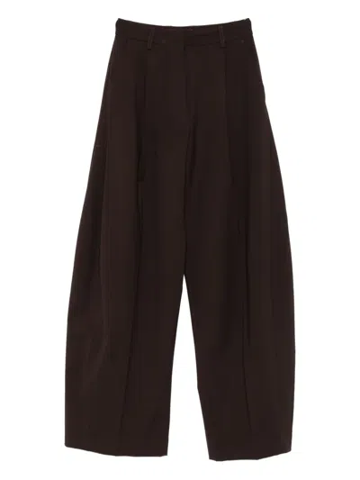 THE LATEST PLEATED TROUSERS