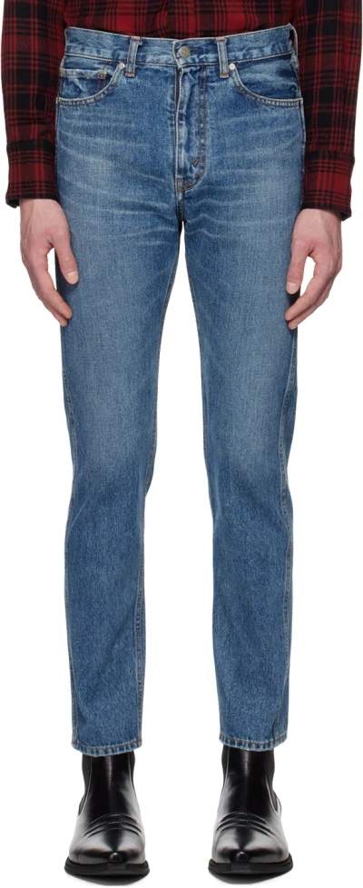 The Letters Blue Washed Jeans In Indigo