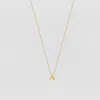 The M Jewelers The Tiny Single Initial Block Necklace In Gold