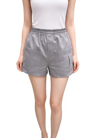 The M Short Woman  With Tasconi In Gray