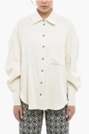 Shop The Mannei Linen-blend Oversized Shirt With Asymmetric Hem