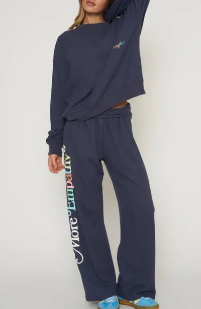 The Mayfair Group World Needs Empathy Waffle Knit Fleece Graphic Sweatpants In Blue