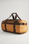 THE NORTH FACE BASE CAMP DUFFLE-M CONVERTIBLE DUFFLE BAG IN AMBER TAN, MEN'S AT URBAN OUTFITTERS