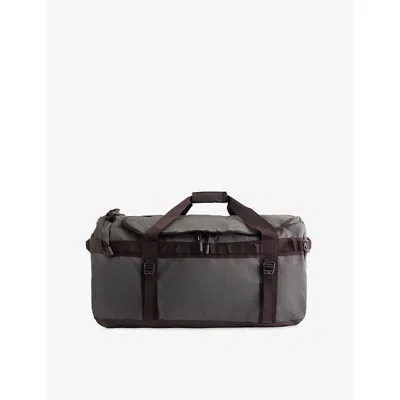 The North Face Base Camp Medium Woven Duffle Bag In Red