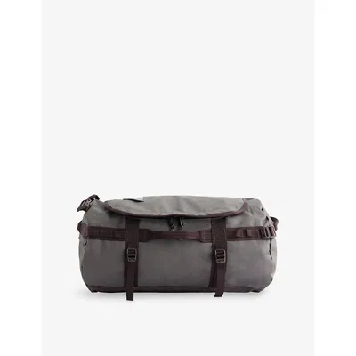 The North Face Base Camp Woven Duffle Bag In Red
