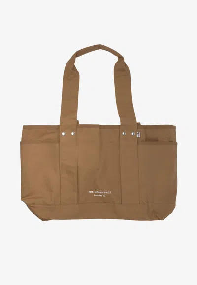 The North Face Circular Logo Canvas Tote Bag In Brown