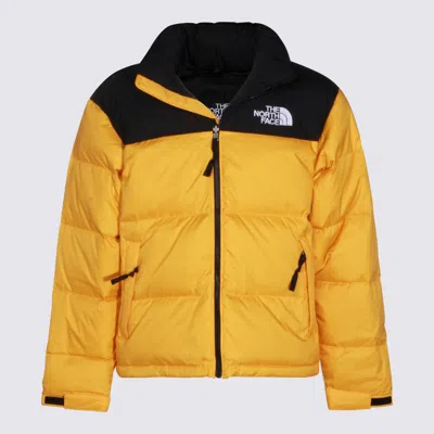 The North Face Coats Summit Gold In Yellow