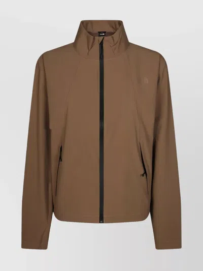 The North Face Dome Wind Jacket With High Collar And Side Pockets In Brown