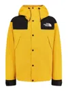 The North Face Windbreaker Jacket With Drawstring And Hood In Yellow