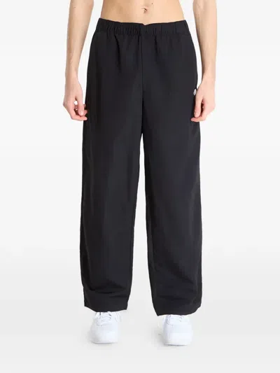 The North Face Easy Wind Trousers In Black