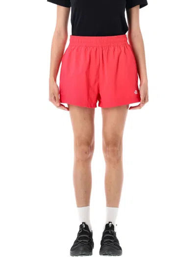 The North Face Fuchsia Logo Shorts In Red