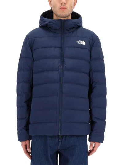 The North Face Jacket With Logo In Blue