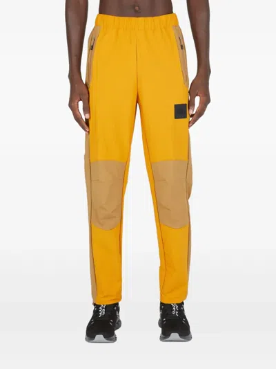 The North Face Lightweight Shell Suit Pants In Orange