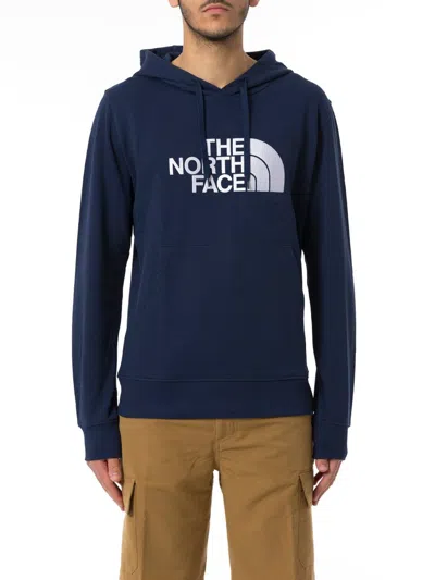 The North Face Logo Embroidered Drawstring Hoodie In Blue