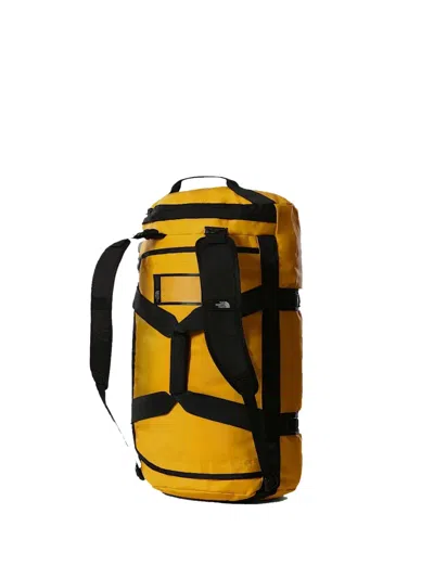 The North Face Logo-print Backpack In Yellow