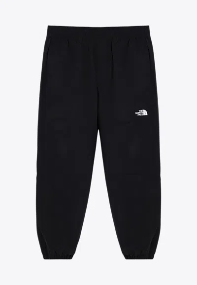 THE NORTH FACE LOGO PRINT TRACK PANTS