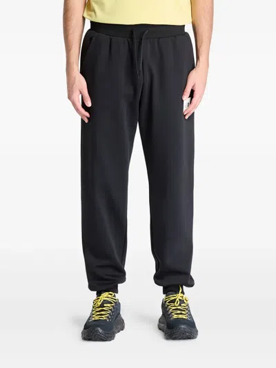 The North Face Logo Tapered Joggers In Black