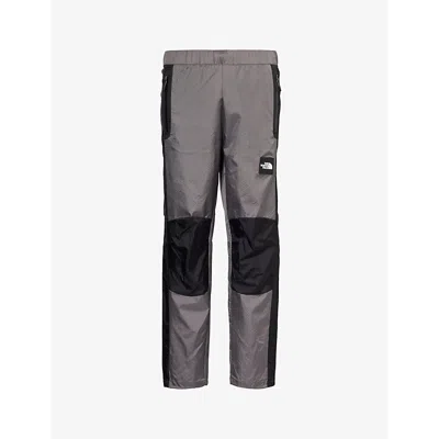 The North Face Wind Brand-patch Straight-leg Mid-rise Shell Trousers In Smoked Pearl/black