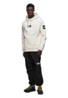 The North Face Logo Printed Drawstring Hoodie In Beige