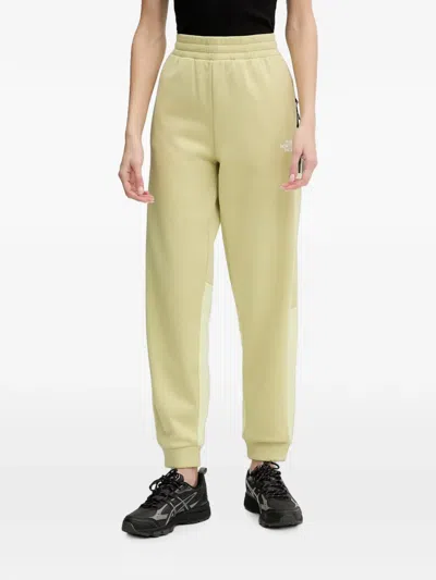 The North Face Mountain Athletics Fleece Track Pants In Green