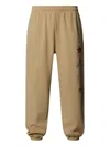 The North Face Unisex Mountain Cleanup Relaxed Joggers In Brown