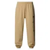 The North Face Unisex Mountain Cleanup Relaxed Joggers In Brown