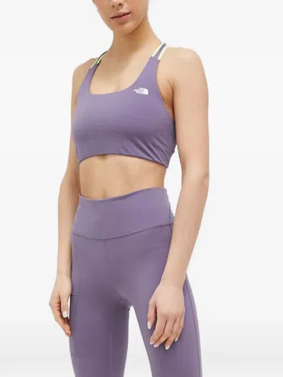 The North Face Movmynt Logo-print Racerback Sports Bra In Purple