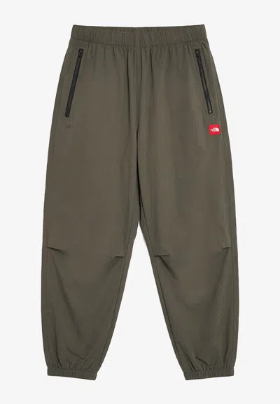 The North Face Red Box Packable Wind Pants In Green