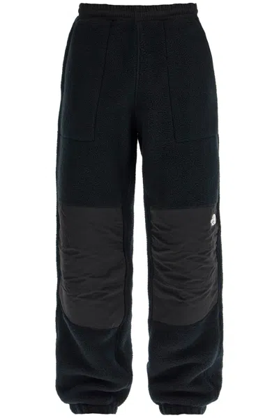 The North Face Retro Denali Fleece Sports Pants. In Black