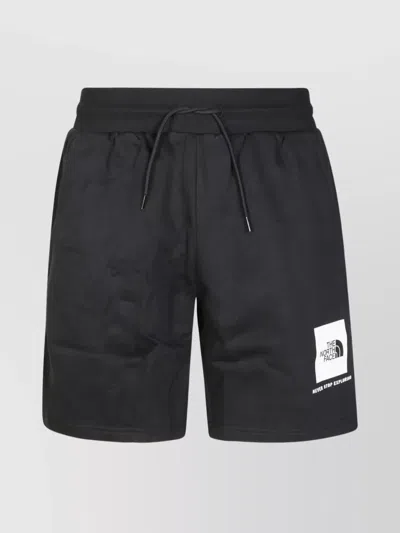 THE NORTH FACE SIMPLE DOME TAPERED JOGGER