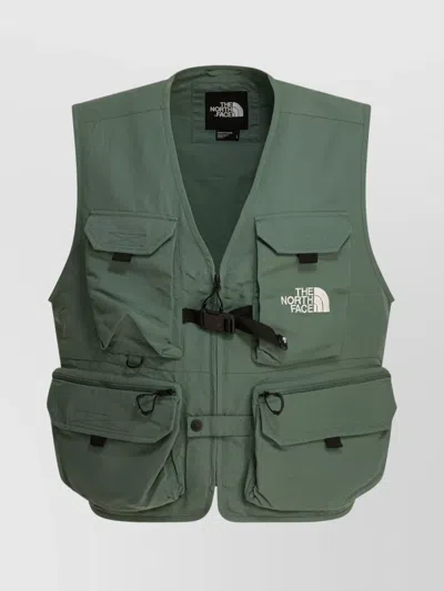 The North Face Sleeveless Mesh Buckle Front Pockets Jackets In Duck Green Verde