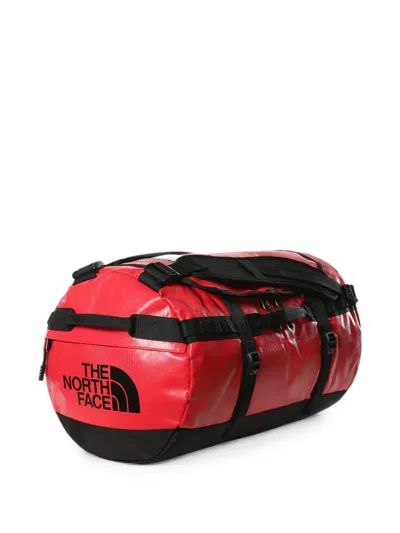 The North Face Small Base Camp Duffel Backpack In Red